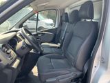 the interior of a car with black leather seats and a steering wheel