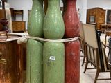 three vases stacked on top of each other on a table