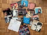 a lot of music books on the floor on the floor