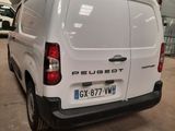 a white van that is parked in a garage