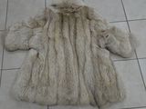 a fur coat on the floor on the floor