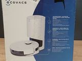 La boîte du robot aspirateur-laveur est ouverte sur la table.