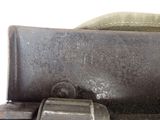 a close up of a piece of metal with a piece of metal on it