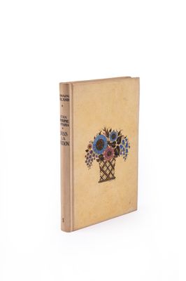 un livre sur lequel figure l'image d'un vase rempli de fleurs
