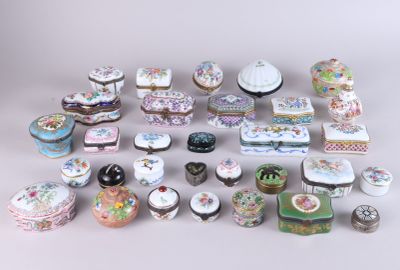 an image of a collection of porcelain objects on a white surface