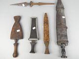 five different types of knives on a white surface