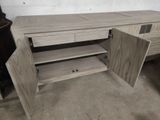 an image of a wooden desk with drawers and shelves