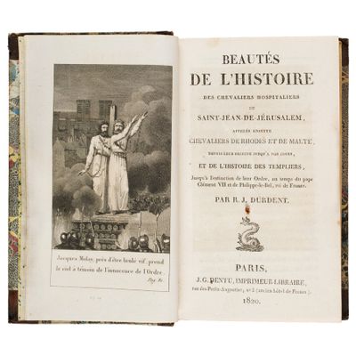 an old book with a picture of a woman holding a cross