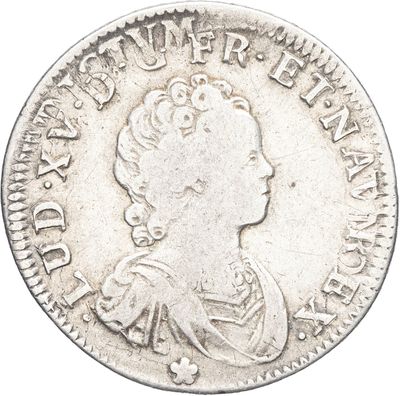 gros plan d'une pièce de monnaie sur fond blanc