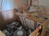 a box with a fan inside of it on the floor
