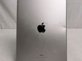 a close up of the back of an ipad with a white background