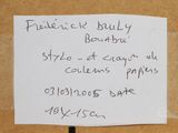 a piece of paper that has a note attached to it