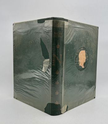 a green book with a picture of a woman on it