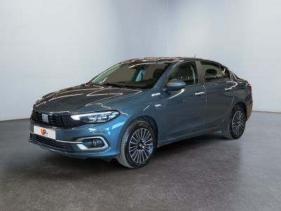a blue car is parked in a room with a white wall