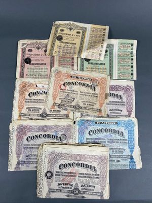 several old currency notes are stacked on top of each other