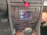 a car dashboard with a clock and radio in it
