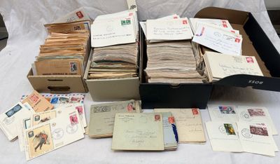 a box full of mail sitting on top of a table