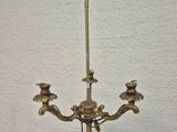 a lamp that is on a stand on a table