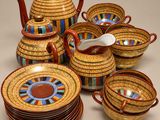 an image of a group of bowls and a teapot on a table
