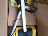 a box with a vacuum and a vacuum cleaner in it