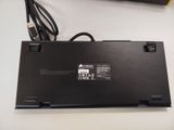 a laptop that is sitting on a table with a charger