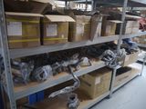 many boxes and packages on the shelves in the warehouse