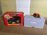 a box with a toy tractor and a box with a toy tractor