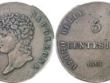 a silver coin with a woman ' s head on it