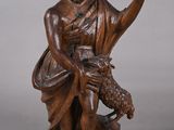 statue représentant un homme avec un chien et une chèvre