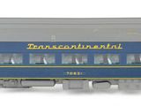 a blue train car that is sitting on a white surface