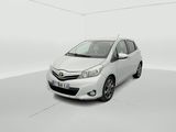 the toyota yaris is parked in a white room with a white floor