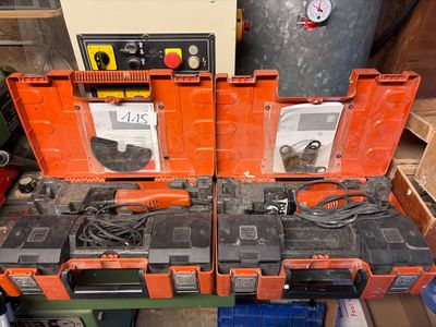 many batteries in the orange case on the table