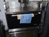 an image of a kitchen with stainless steel appliances