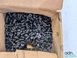 a box full of screws and nuts sitting on a table