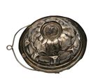 a silver pot with a handle on a white background
