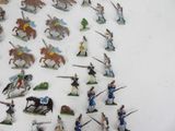 a lot of figurines that are on a table