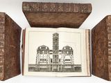a book opened to show a drawing of a building