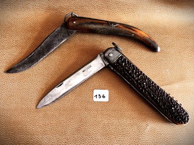 a knife and a knife holder on the table