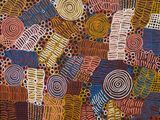 a close up of a painting with many circles on it