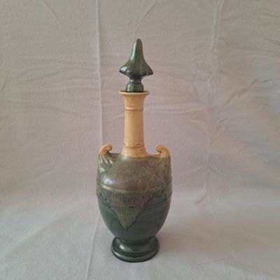 Bouteille forme Amphore Revol St Uze pour la distillerie Ben…