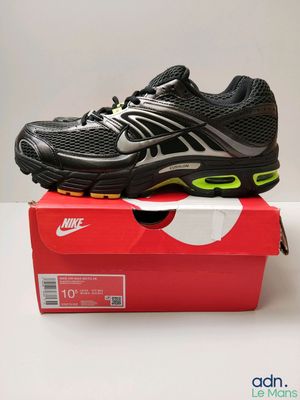 the nike air max is on top of a red box