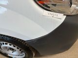 a close up of a car with a sticker on it ' s bumper