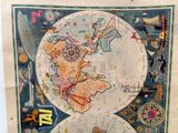a map of the world hanging on a wall