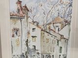 framed watercolor painting of a street scene with a church in the background