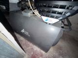 an image of an air compressor in a garage