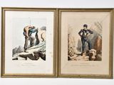 two framed prints of a man and a woman standing on a rock