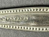 silverware spoon with the name of a silverware company on it