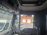 a view of the inside of a bus from the driver ' s seat