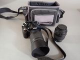 a camera and a camera bag on a table