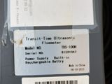 une étiquette au dos d'un téléphone portable sur laquelle est inscrit « trans - time ultrasonic »